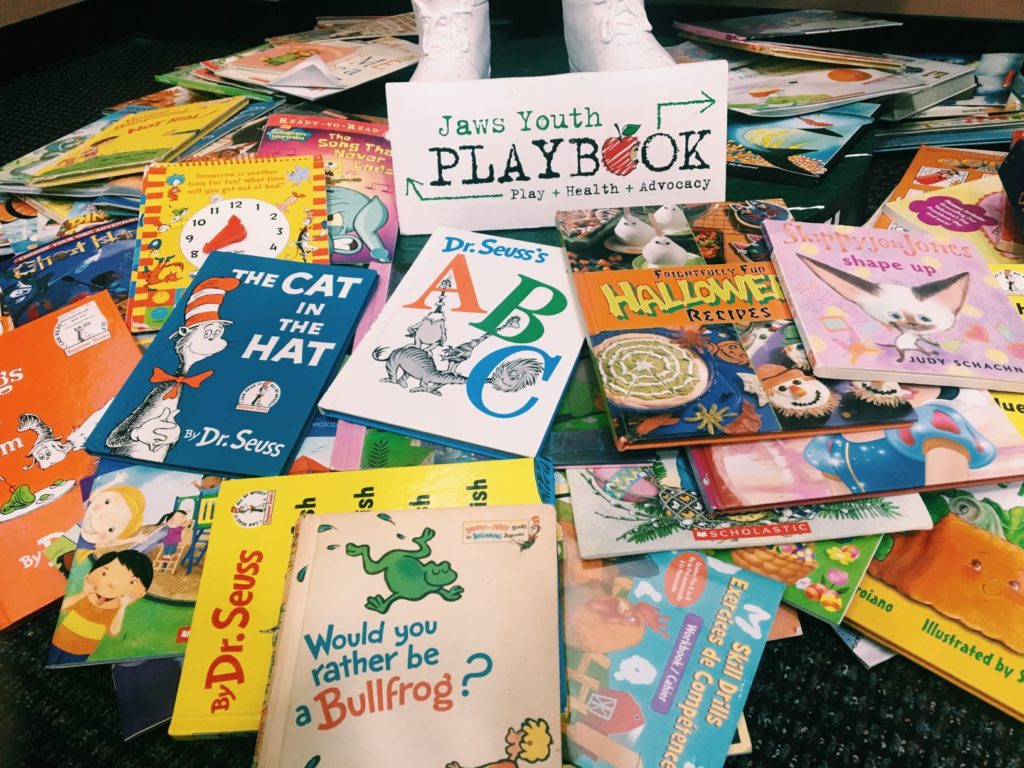 Jaws Youth Playbook partners with Rebecca's Mission for Read Across America Book Drive